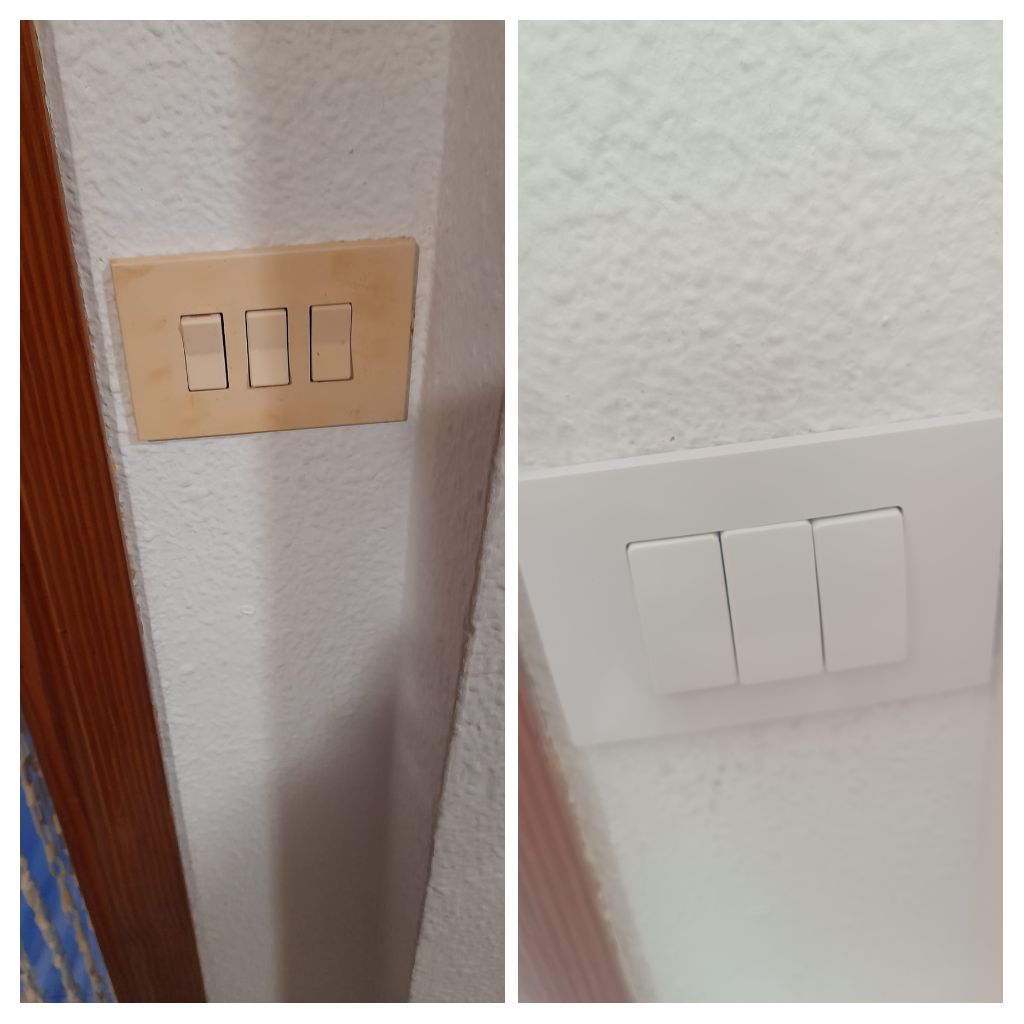 Instalación de llaves de luz triples blancas